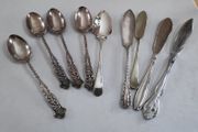 5 epns spoons,  3 epns butter knives, 1 stainless steel butter knife