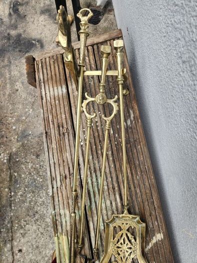 antique polished fire dog and irons