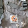 Baby feeding high chair + ergobaby child carrier. Image 6