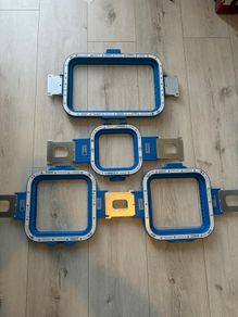 Magnetic hooping station and hoops