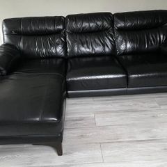 Black L shaped Leather Couch