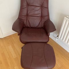 Reclining swivel leather chair