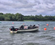 19ft McAlinden "Fisher Supreme" Lake Boat/Trailer