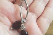 Dark amber in silver earrings
