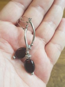Dark amber in silver earrings