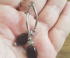 Dark amber in silver earrings