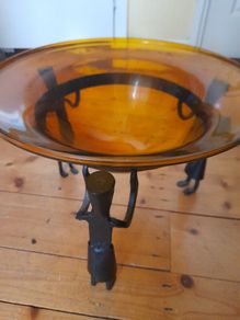 Home decor glass bowl on metal stand
