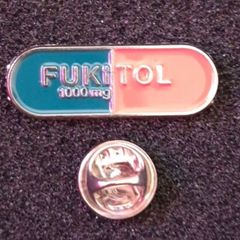 Fukitol 1000mg , pin back badge.