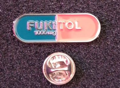 Fukitol 1000mg , pin back badge.