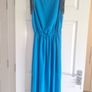 Ladies vibrant blue full-length dress with sleeve detail and back detail. Image 3