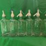 6 Antique Soda Bottles and Crate Image 2