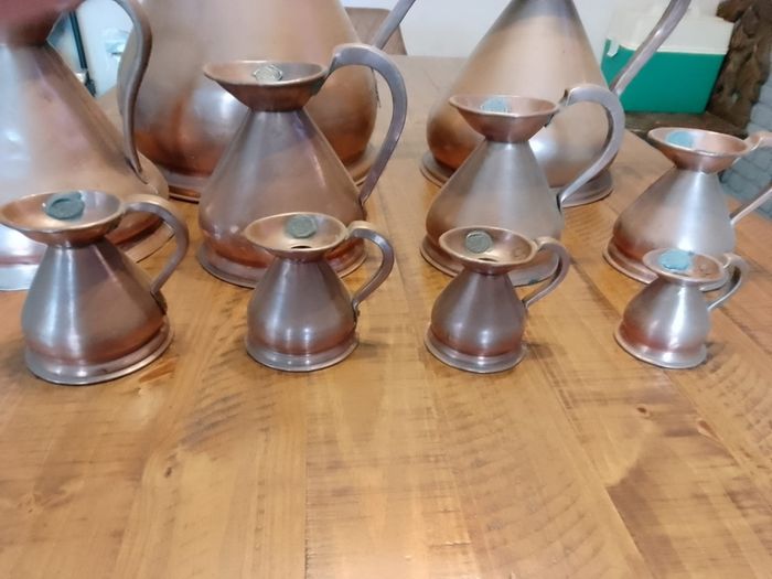 vintage copper measure jug collection
