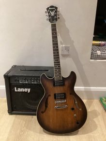 As new Ibanez AS53-TF electric guitar + amp.