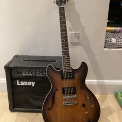 As new Ibanez AS53-TF electric guitar + amp.