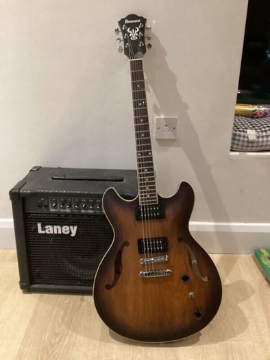As new Ibanez AS53-TF electric guitar + amp.
