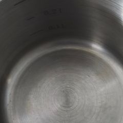 C CROFTON 20 / 16 stainless steel copper plated saucepan featuring internal volume measurement markings. .0.3 L.