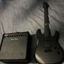 Electric guitar with amp and bag Image 2