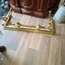 Beautiful Antique Victorian Art Nouveau Brass Fireplace Fender features ornate scrolling end terminals and central urn finials, Image 3