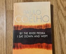 By The River Piedra I Sat Down And Wept by Paulo Coelho
