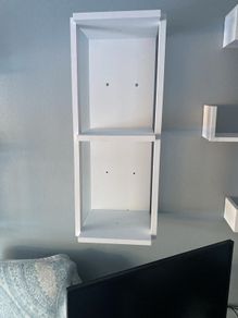Set of two wall shelves