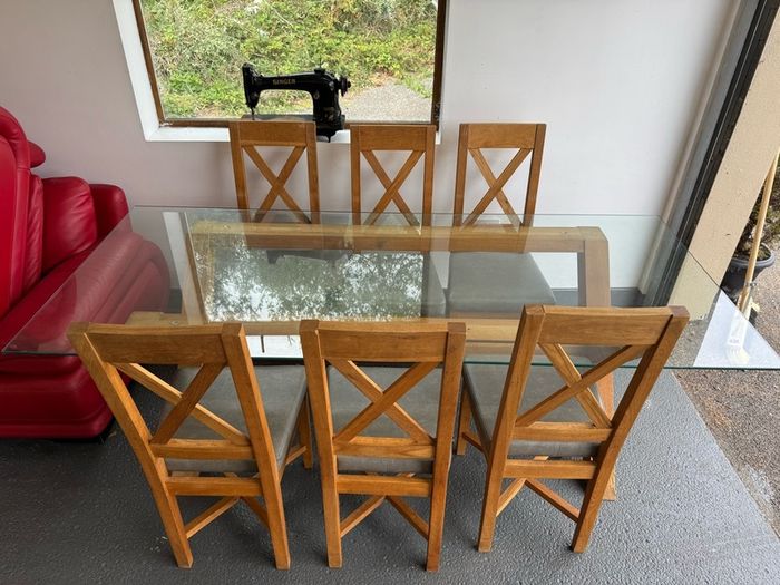 Glass dining room table with 6 chairs