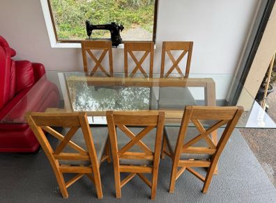 Glass dining room table with 6 chairs
