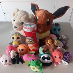 Large collection of assorted soft toys and plushies