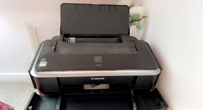 Canon printer, perfect condition bar (1 little clip broke from paper holder)
