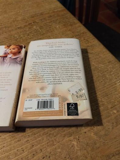 2 paperback books, true story