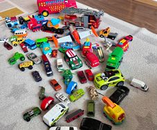 Toy cars and other vehicles with garage