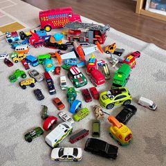 Toy cars and other vehicles with garage