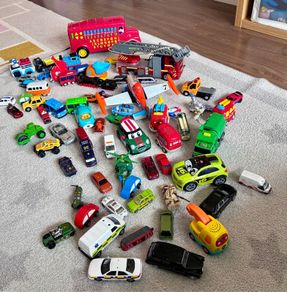 Toy cars and other vehicles with garage