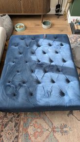 Navy footstool/ottoman from Next. Good condition. Material has rip so needs repair or reupholstery.