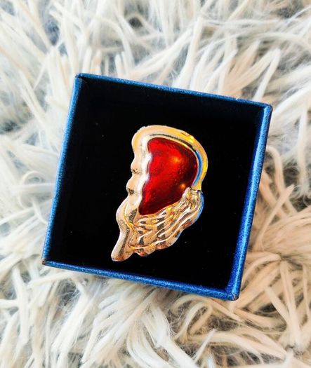 Unique design ring with a red angel wing stone