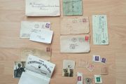Collection of historical ephemera includes vintage envelopes, postage stamps, two photos and a bank check from the mid-20th century.Items date from the 1920s to the 1960s