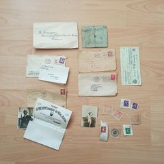 Collection of historical ephemera includes vintage envelopes, postage stamps, two photos and a bank check from the mid-20th century.Items date from the 1920s to the 1960s