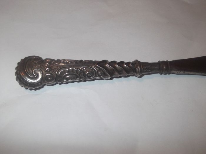 a antique silver handle and steel shue horn