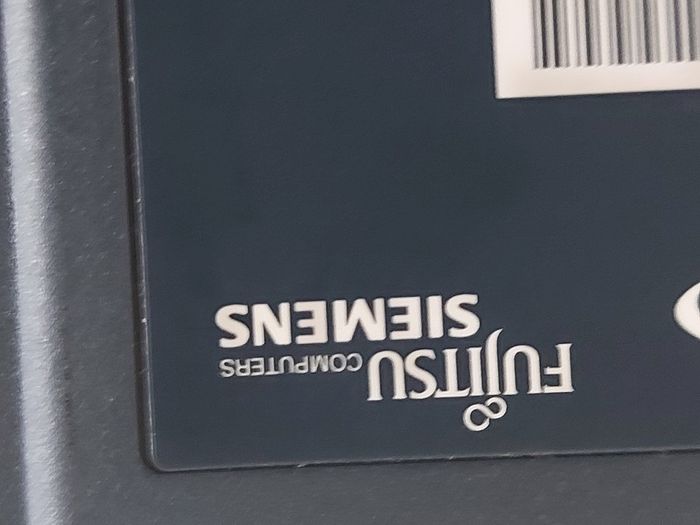 Rare Vintage Fujitsu Siemens Lifebook, E Series, FPC07048B Part number CP127259, Running Windows 2000 Professional, uses 3.5 floppy disk, 20GB HDD, amd all the connecting Ports from 30 years ago Era