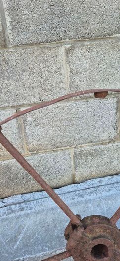 old wrought iron wheel.