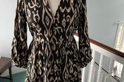 Brand new black and beige long sleeved mini dress