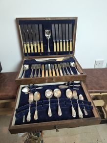 Vintage cutlery set in wooden box
