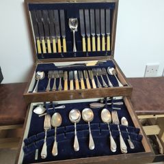 Vintage cutlery set in wooden box