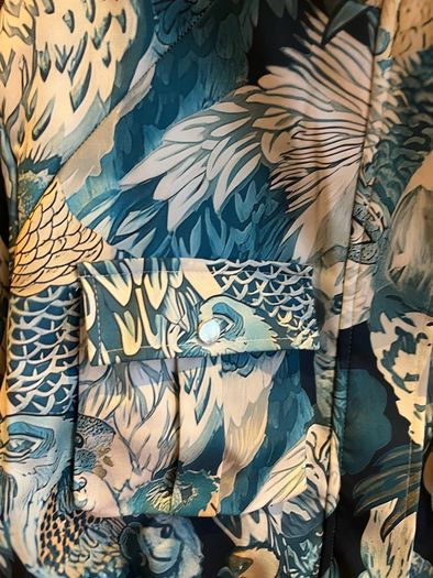 Bird print blue bomber jacket