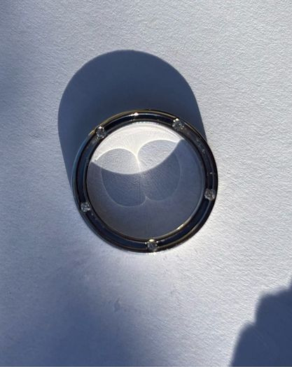 Platinum Damiani style ring, 10rd 0.09ct Diamonds