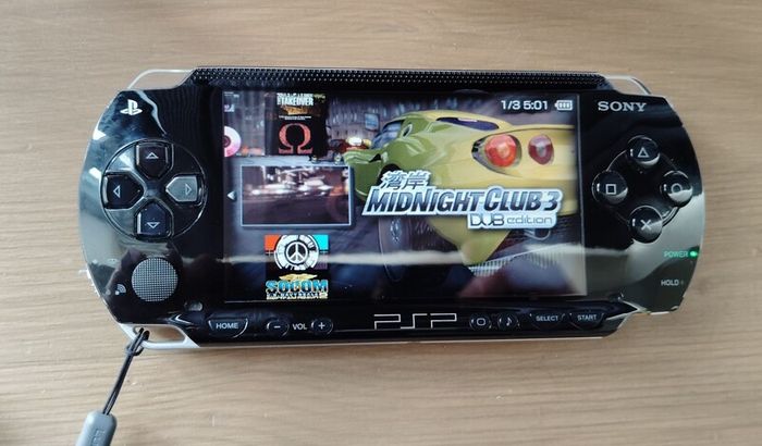 Psp 1000 Modded 64 GB 40 psp games Original battery charger cable