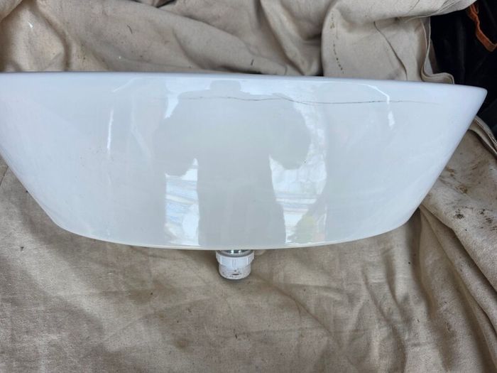 Countertop basin with countertop mounted tap