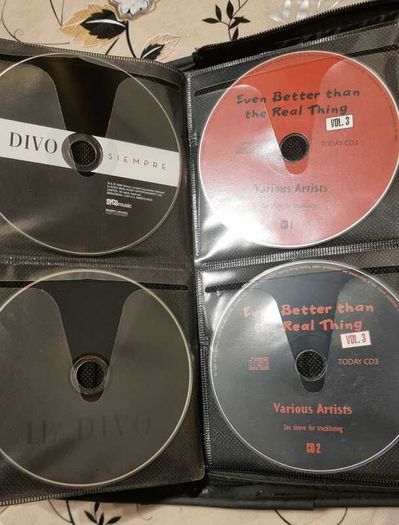 80 CD + Case. All CD's in perfect playable condition.