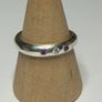 Handmade sterling silver ring with flush set stones. Size O Image 6