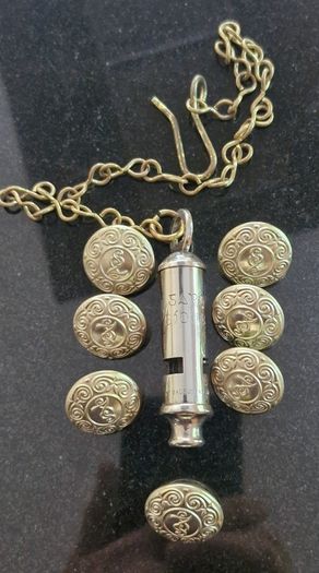 An Early Garda Siochana Whistle And Set Of 7 Buttons
