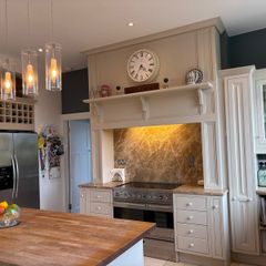 Kitchen cabinets, island and marble